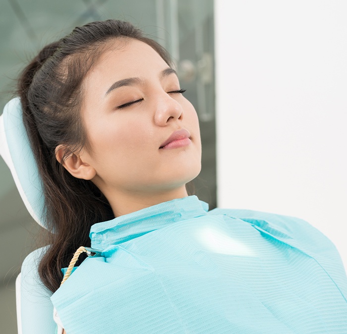 Woman under oral conscious sedation resting