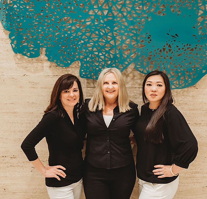 Three dental team members