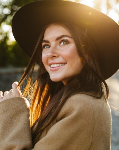 Woman with beautiful smile after cosmetic dentistry