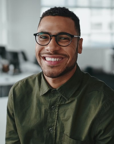 Man with flawless smile after emergency dentistry